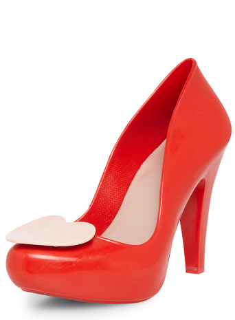 Mel Red Rubber Court Shoes Price: £55.00 click to visit Dorothy Perkins