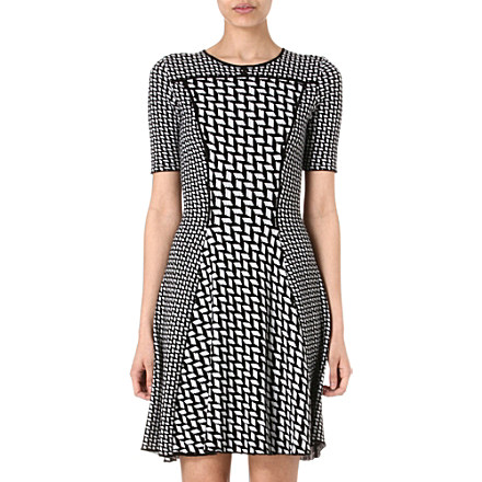 KENZO Graphic jacquard dress Was £450.00 Now £175.00 click to visit Selfridges
