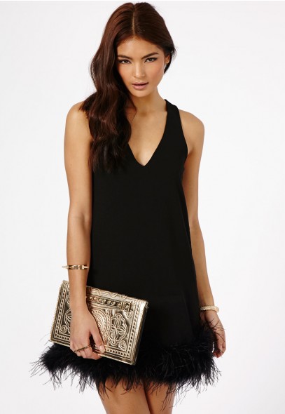 Claral Prom Dress With Feathered Hem Detail £39.99 click to visit Missguided